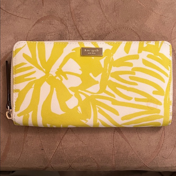 kate spade Handbags - Kate Spade Tropical Yellow and White Wallet
